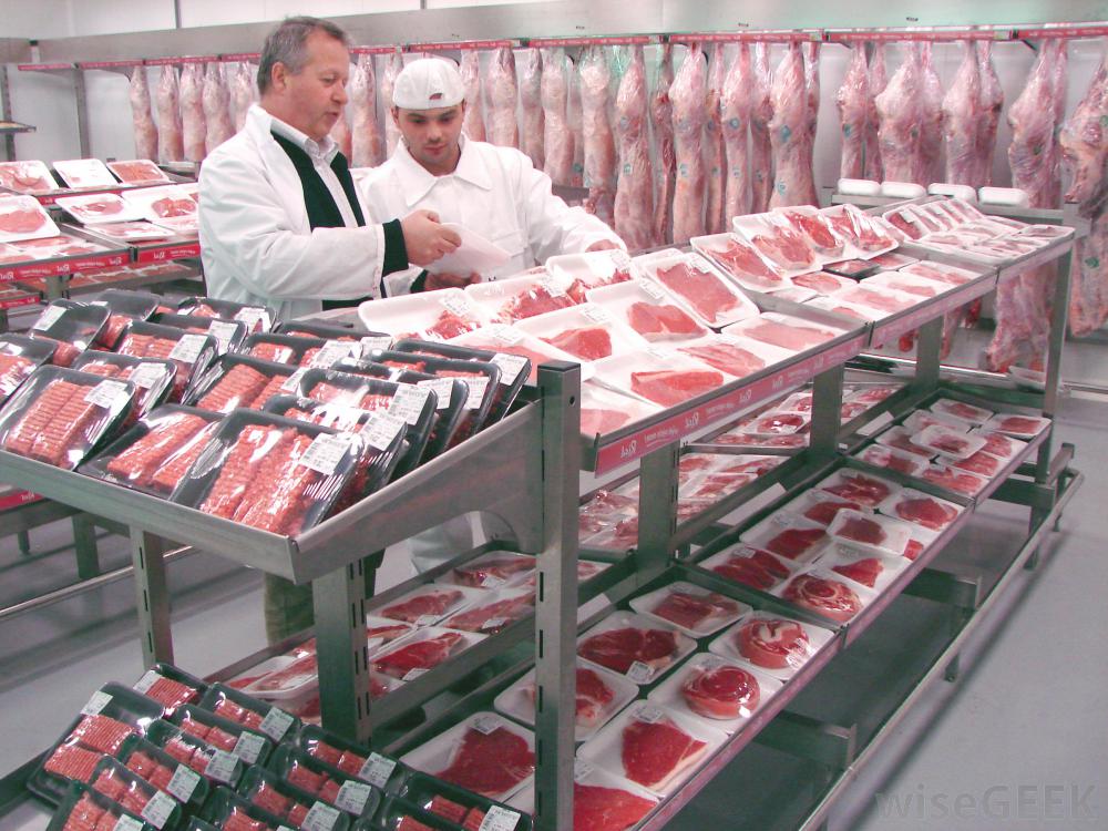 meat-being-packaged-at-a-processing-plant